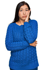 Sticker - Young hispanic woman wearing casual clothes thinking looking tired and bored with depression problems with crossed arms.