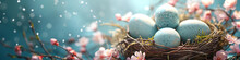 Frame With White And Blue Speckled Easter Eggs And Cherry Blossoms On Light Blue Background. Happy Easter Concept