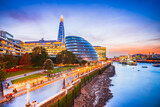 Fototapeta Londyn - London, United Kingdom. Skyline view of the famous New London, City Hall and Shard, Thames River southbank.