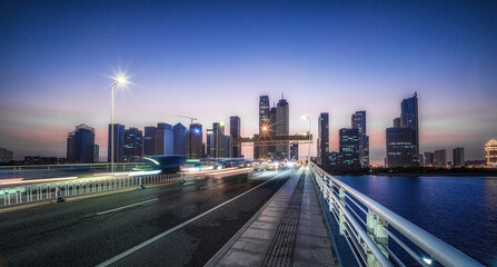 Sticker - Busy City Bridge at Twilight with Dynamic Light Trails