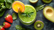 Healthy green smoothie with spinach and strawberry and orange slice in a glass against a wood background. Banner with copy space, promoting a nutritious and refreshing beverage.