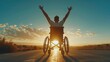 Emotional Liberation: A man in a wheelchair greets the sun on a deserted road, his arms outstretched, his posture radiating joy and freedom.