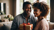 St. Valentine's Day. Young African American couple smiling on their special day, giving each other gifts. Exchange of gifts between a girl and a guy. Romance, tenderness and joy of love. Lovers