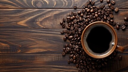 Top view coffee beans with a cup of black coffee on a wooden background