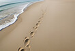 Empreintes d'Homme dans le sable avec la mer au loin