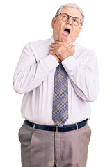 Canvas Print - Senior grey-haired man wearing business clothes shouting and suffocate because painful strangle. health problem. asphyxiate and suicide concept.