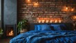 Bed with blue pillow and coverlet near fireplace. Loft interior design of modern bedroom with brick wall 