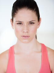 Poster - Portrait, fitness and sports with a young woman in studio on a white background for health or wellness. Natural face, exercise and a serious female athlete looking confident with her training