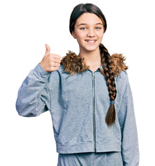 Poster - Young brunette girl with long hair wearing casual sweatshirt smiling happy and positive, thumb up doing excellent and approval sign