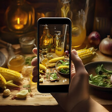 Human Hand Holding Smart Phone Taking Picture Of Table Set With Corn, Dishes, Vegetables. Corn As A Dish Of Thanksgiving For The Harvest, Picture On A White Isolated Background.