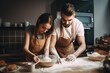 cropped shot of a man and woman baking together at home