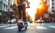 Person commuting on an eco-friendly electric scooter on a sunny urban city street, showcasing sustainable transportation and modern lifestyle