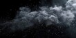 A close-up view of a cloud of white powder on a black background. This image can be used to depict substances, drugs, or mysterious and abstract concepts