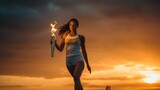 Fototapeta  - A female athlete runs with a torch, holding the Olympic flame against the sky.