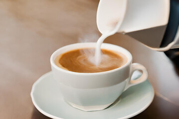 A cup of coffee on a saucer