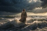 Fototapeta  - A young man in the likeness of Jesus Christ walks on the sea against the sun and sky