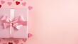© Vasyl - Valentine's Day decorations with a white gift box adorned with a pink silk ribbon bow and small hearts on an isolated pastel pink background, creating a visually pleasing image with copyspace.