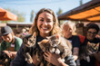 A team of volunteers assisting at an animal adoption event, connecting pets with loving families.