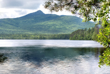 Wall Mural - Scenic Lake Chocorua and prominent summit of rugged Mount Chocorua in White Mountains of New Hampshire.