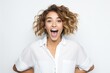 Portrait of young excited woman on white background