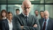 © ProPhotos - Portrait of angry executive surrounded by male colleagues in office