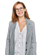 Young caucasian woman wearing business style and glasses with a happy and cool smile on face. lucky person.