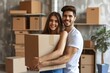 Smiling young couple holding a cardboard box at a new apartment
