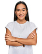 © Krakenimages.com - Young asian woman wearing casual white t shirt happy face smiling with crossed arms looking at the camera. positive person.