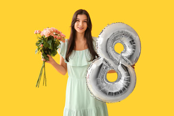 Poster - Beautiful young woman with silver air balloon in shape of figure 8 and bouquet of pink roses on yellow background. International Women's Day