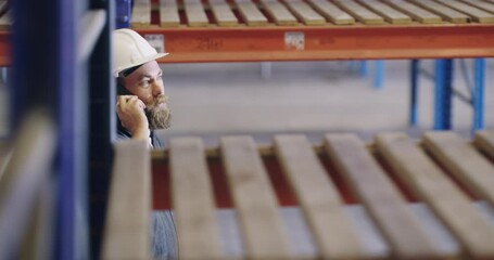 Poster - Logistics, man or walking in warehouse on a phone call talking for communication in discussion. Distribution, mobile conversation or male contractor speaking or planning inspection for supply chain