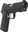 Semi-automatic handgun angled toward the viewer