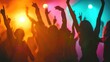 © buraratn - Silhouette of young people with raised flutes having fun and clubbing
