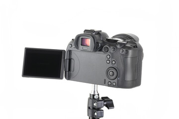 Big Black and Modern digital mirrorless Camera full frame sensor with lens on white background.