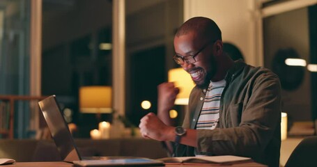 Poster - Winner, computer and work from home celebration at night for stock market investment, trading or news of bonus. Excited African freelancer or trader with fist, yes and success on a laptop for goals