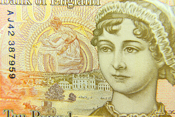 London, UK, 2 January 2024: Close up of the reverse of a £10 note from the United Kingdom featuring a portrait of the author Jane Austen with with selective focus 