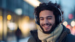 © AspctStyle - Joyful Man with Headphones Enjoying Winter Day in the City, Urban Lifestyle and Music Enjoyment Concept