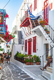 Fototapeta Miasta - View of whitewashed cobbled street, Little Venice of Mykonos . Greek Island.
