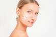 Beauty woman face with spf sunscreen. Skincare treatment, facial lotion anti aging.