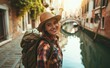© Mr. Bolota - Venetian Adventure: A Young Native Woman, Backpack Adorned, Captures the Joy of Traveling with a Selfie near a Venice Bridge - A Genuine Smile Amidst Italian Heritage.