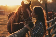 Portrait Of Beautiful Woman And Horse At The Horse Farm. Cowgirl Petting Her Horse. Young Girl Stroking A Brown Horse
