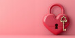 Heart shaped locked padlock with key on pink background