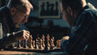 Focused man playing chess at table with his opponent