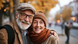 Fototapeta  - Happy and smiling senior couple looking at the camera, an old couple in love. lifestyle photography