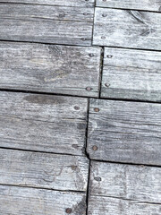 Wall Mural - gray wooden floor planks background with cracks and nails.