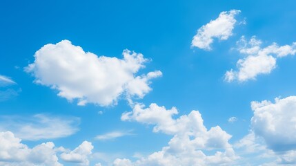 Wall Mural - Beautiful blue sky with fluffy white clouds on a sunny day