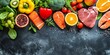 Background healthy food. Fresh fruits, vegetables, meat and fish on table. Eating for healthy heart. Healthy food, diet and healthy life concept. Top view, copy space