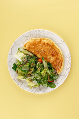 Poster - Omelet with vegetables on a plate . breakfast