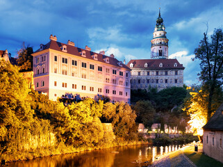 Wall Mural - Cesky Krumlov with castle, old town and church at dramatic mist, Czech Republic
