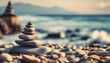 © Iqra - stack of stones on beach