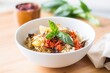 quinoa bowl with marinated artichokes and sundried tomatoes